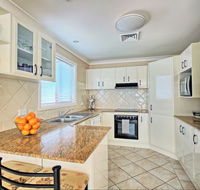 Aqua Leaf Apartment - Getaway Accommodation
