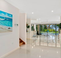 Luxury Living on the Beachfront - Getaway Accommodation