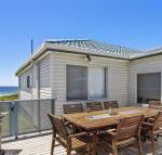 Blue Horizon beachfront with fireplace - Getaway Accommodation