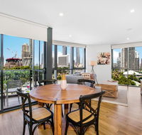 Coastal Apartment with Balcony Parking and Pool - Getaway Accommodation