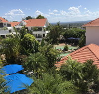 Haven on Noosa Hill - sunset views pools spa - Getaway Accommodation