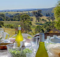 The Farmhouse - grape vines and rolling green hills - Getaway Accommodation