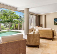 The Stanwell Beach Glass House - beach  pool - Getaway Accommodation